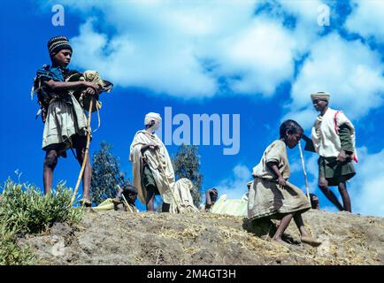 Ethiopia, 1970s, Lalibela, people against blue sky, Amhara region, East Africa, Stock Photo