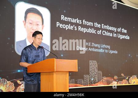 (221221) -- KAMPALA, Dec. 21, 2022 (Xinhua) -- Chinese Ambassador to Uganda Zhang Lizhong addresses the launching event of a document titled 'Chinese Enterprises Social Responsibility Report 2022' in Kampala, Uganda, Dec. 20, 2022. A document, titled 'Chinese Enterprises Social Responsibility Report 2022,' was launched by Uganda's Vice President Jessica Alupo at an event held Tuesday in Kampala, the Ugandan capital. The report, which sampled 21 out of 129 member enterprises of the Chinese Chamber of Commerce in Uganda, showed that the enterprises have supported local communities by providin Stock Photo