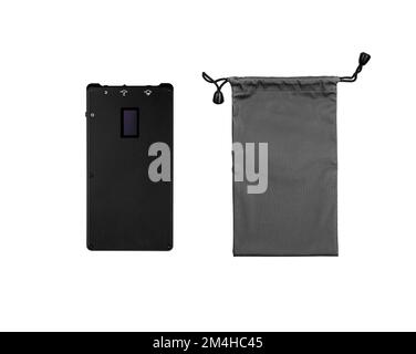 A small portable LED panel on the battery. Lighting device for photo and video filming. Isolate on a white background. Stock Photo
