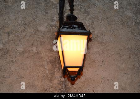 Old lamp on the street with snow Stock Photo