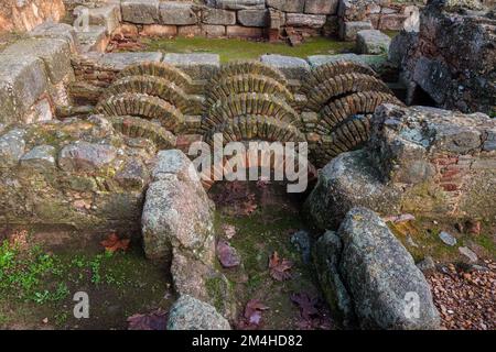 Roman archaeological remains of the ancient thermal baths located in the Casa del Anfiteatro. Merida. Spain. Stock Photo