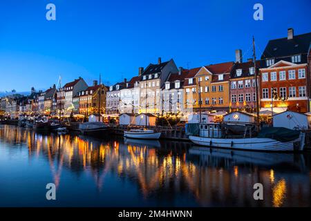 Nyhavn Canal at sunset, Christmas time, Nyhavn Copenhagen, Denmark Stock Photo