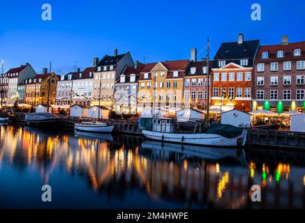 Nyhavn Canal at sunset, Christmas time, Nyhavn Copenhagen, Denmark Stock Photo