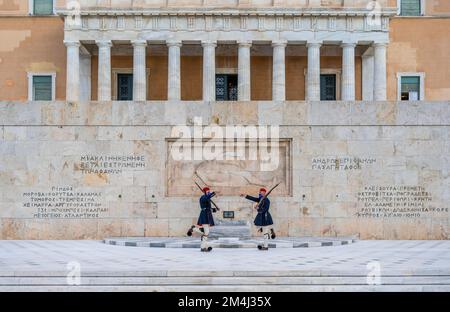 Detachment of the Presidential Guard Evzones in front of the Monument to the Unknown Soldier near the Greek Parliament, Syntagma Square, Athens Stock Photo