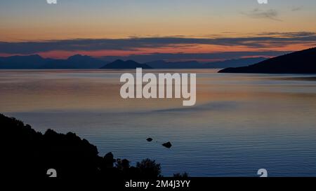 Molos Bay, dawn, red sunshine, main town, Vathi, Ithaca Island, Ionian Islands, Greece Stock Photo