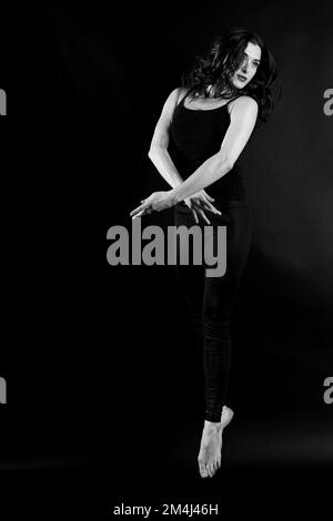 A young Caucasian female from Bosnia and Herzegovina in a black shirt ...