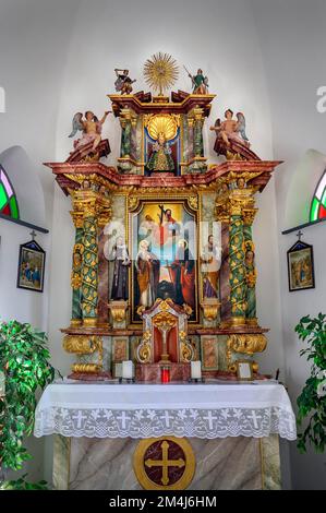 Main altar, Chapel of St. Peter and Paul from 1902, Jungholz-Langenschwand, Tyrol, Austria Stock Photo