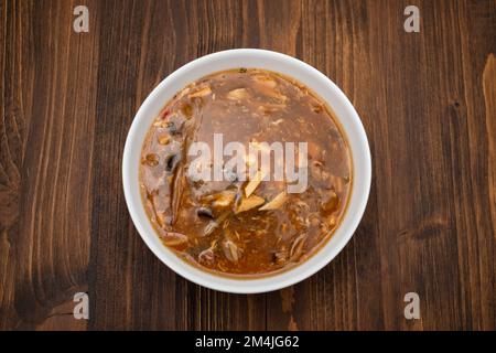 Traditional Japanese hot and sour soup cooked with greens. Asian cuisine Stock Photo