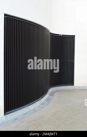 External vent grill on curved wall of a modern building Stock Photo