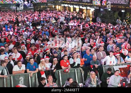 England fans at Boxpark, Wembley, London this evening to watch FIFA World Cup match between England and France.   Image shot on 10th Dec 2022.  © Beli Stock Photo