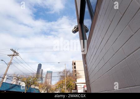Surveillance camera looking down on city street. Stock Photo