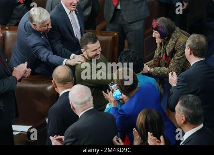 Washington, United States. 21st Dec, 2022. President Volodymyr Zelensky of Ukraine is greeted by members of Congress as he arrives to deliver an address at the U.S. Capitol in Washington, DC on Wednesday, December 21, 2022. Zelensky met with President Joe Biden earlier in the day as the White House announced an additional $2 billion in military assistance for Ukraine, including a sophisticated Patriot missile battery. Photo by Pat Benic/UPI Credit: UPI/Alamy Live News Stock Photo