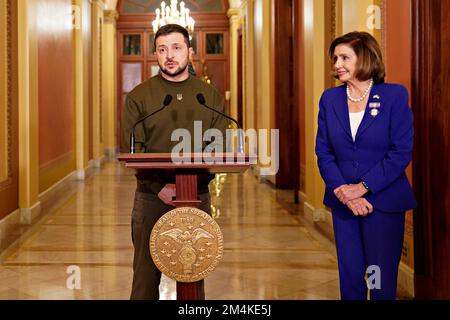 Washington, US, December 21, 2022. Washington, DC, USA. 21st Dec, 2022. President Volodymyr Zelenskiy, of Ukraine, speaks while meeting with Speaker of the United States House of Representatives Nancy Pelosi (Democrat of California), right, at the US Capitol in Washington, DC, US, on Wednesday, Dec. 21, 2022. President Biden welcomed Zelenskiy to the White House today as the Ukrainian president sought to firm up US support for Kyiv's defense against Russia in his first trip outside his country since Moscow's forces invaded. Credit: Nathan Howard/Pool via CNP/dpa/Alamy Live News Stock Photo