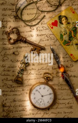 Queen Of Hearts On Old Letter, with wonderful pocketwatch and skeleton key Stock Photo
