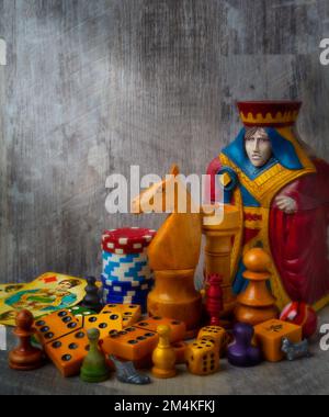 The Queen And Knight With Game Pieces Still life Stock Photo
