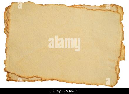 isolated stack of blank tan toned heavyweight deckle edge paper sheets Stock Photo