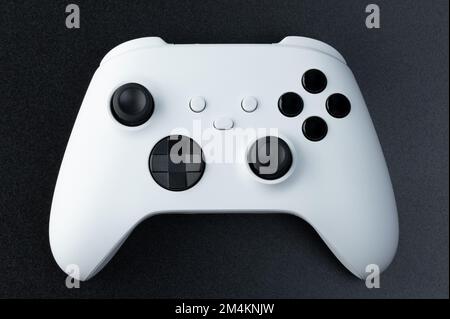 White game controller joystick on black background isolated Stock Photo