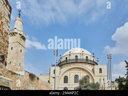 The Ramban synagogue is the oldest functioning synagogue in the Old city. Jerusalem, Israel. Minaret of Sidna Omar Mosque. Stock Photo