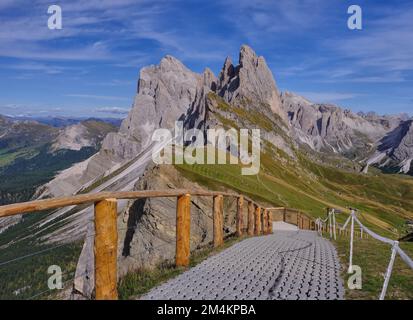 Walking path at Geislerspitzen massif on Seceda with view to Odle mountains, Val (Valley) Gardena, Dolomites, South Tyrol, Italy Stock Photo