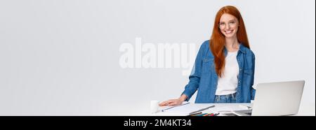 Female designer near big paper sheet with project plan in office Stock  Photo - Alamy