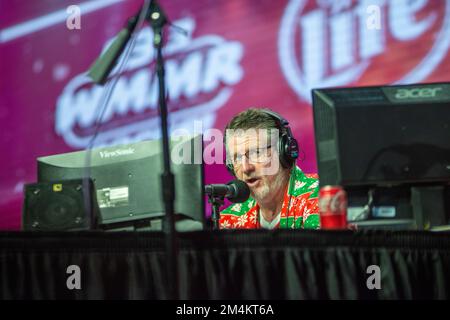 Bensalem, United States. 21st Dec, 2022. Preston Elliot speaks on air as part of WMMR Radio's Ugly Christmas Sweater contest Wednesday, December 21, 2022 at PARX Xcite Center in Bensalem, Pennsylvania. The winner of the contest receives a year supply of beer. Credit: William Thomas Cain/Alamy Live News Stock Photo