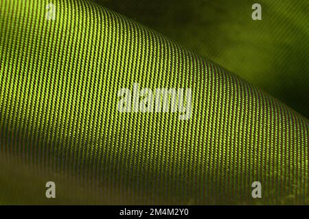 olive silk fabric wrinkled as background close up Stock Photo