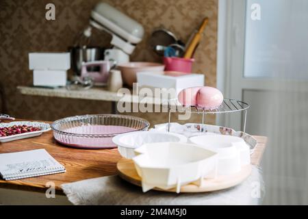 Valentines Day Cupcakes and Cake Recipes Ideas. Valentines Day heart shape pink Mirror Glaze mousse homemade cake on home kitchen Stock Photo
