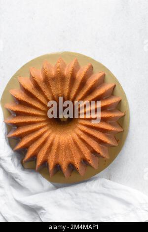 Flat lay of homemade bundt cake, spiral bundt cake, Top view of coconut bundt  cake Stock Photo - Alamy