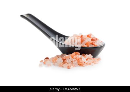 Pink himalayan salt in ceramic spoon isolated on the white background. Stock Photo