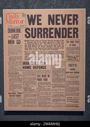 'We Never Surrender' front page headline on the Daily Mirror on 5th June 1940, Imperial War Museum, London, UK. Stock Photo