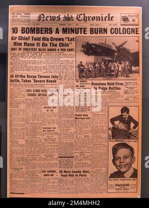 '10 Bombers a minute burn Cologne' headline in the News Chronicle on 1st June 1942, Imperial War Museum, London, UK. Stock Photo