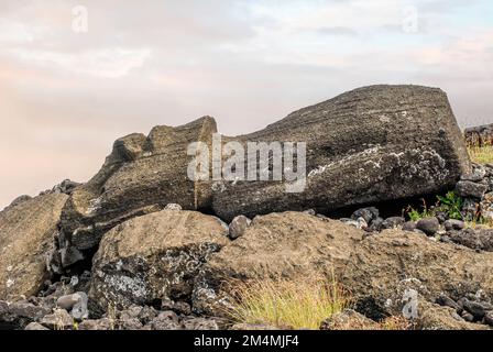 Lying and destroyed Moai sculpture on Easter Island, Rapa Nui, Chile Stock Photo