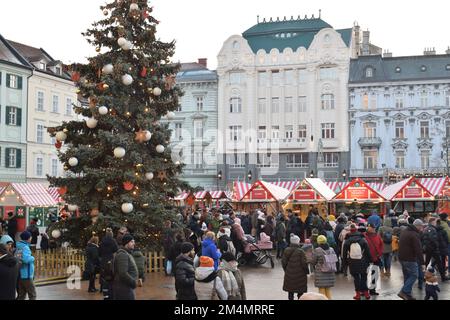 BRATISLAVA, SLOVAKIA - DECEMBER 18, 2022: Christmas market at the main square in the old town. Stock Photo