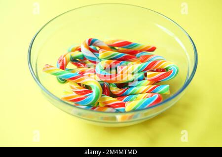 mini cherry candy canes on white background  Stock Photo