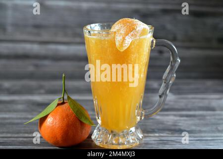 Tangerine Juice, The mandarin orange (Citrus reticulata), also known as the mandarin or mandarine, a small citrus tree fruit. Treated as a distinct sp Stock Photo
