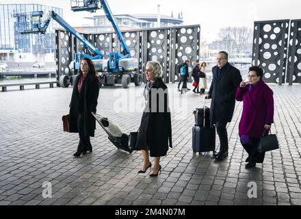 AMSTERDAM - Lawyers Geert-Jan and Carry Knoops, together with Nilufer Gundogan, leave the court after the appeal of the parliamentary group of Volt against the member of parliament. Gundogan was previously suspended by the party following allegations of misconduct. She then instituted summary proceedings and was successful, but Volt appealed. ANP JEROEN JUMELET netherlands out - belgium out Stock Photo