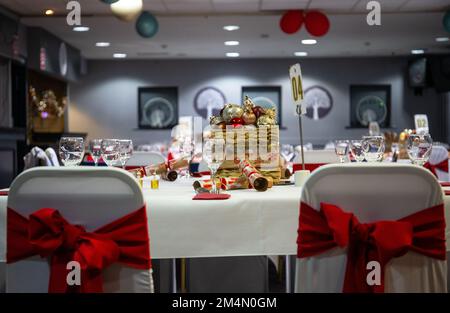 Function room set up for Christmas party event during festive season in UK Stock Photo