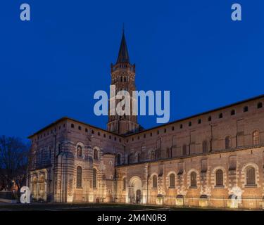 Scenic landscape view of historic landmark St Sernin basilica illuminated in evening, Toulouse, France Stock Photo