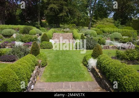 formal part of West Dean gardens in summer near Chichester Sussex England Stock Photo