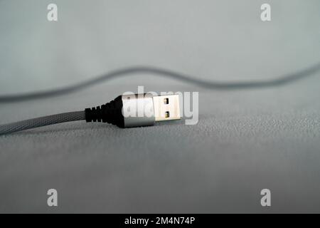 USB cable isolated on green background Stock Photo