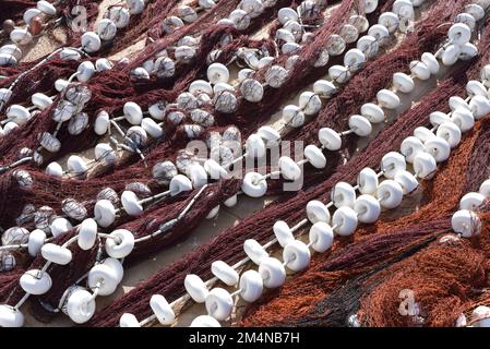Port de Soller, Mallorca, Spain - 11 Nov 2022: Fishing nets in the harbour of Port de Soller Stock Photo