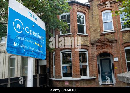 London- September 2022: Open Rent estate agency sign to let Stock Photo