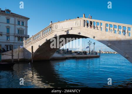 Chioggia bridge, view of the Ponte di Vigo - a historic 14th century bridge designed in the Venetian style spanning the Canal Vena in Chioggia, Italy Stock Photo