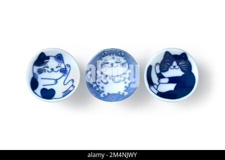 Row of Japanese chopstick rest with cat decoration isolated  on white background Stock Photo