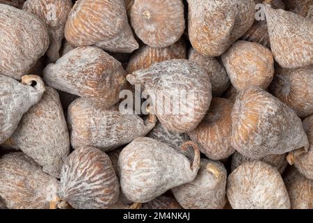 Sweet dried small spanish figs close up full frame as background Stock Photo