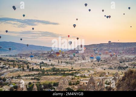 Colorful hot air balloon flying over Cappadocia, Turkey Stock Photo