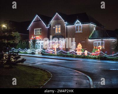 Eastchurch, Kent, UK. 22nd Dec, 2022. Kingsborough Manor estate in Eastchurch, Kent on the Isle of Sheppey goes 'all out' for Christmas with most of the properties in the area being decorated with amazing Christmas lights displays. Credit: James Bell/Alamy Live News Stock Photo