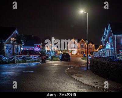 Eastchurch, Kent, UK. 22nd Dec, 2022. Kingsborough Manor estate in Eastchurch, Kent on the Isle of Sheppey goes 'all out' for Christmas with most of the properties in the area being decorated with amazing Christmas lights displays. Credit: James Bell/Alamy Live News Stock Photo