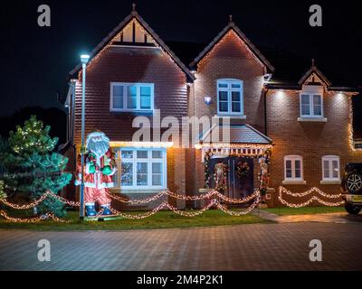 Eastchurch, Kent, UK. 22nd Dec, 2022. Kingsborough Manor estate in Eastchurch, Kent on the Isle of Sheppey goes 'all out' for Christmas with most of the properties in the area being decorated with amazing Christmas lights displays. Credit: James Bell/Alamy Live News Stock Photo