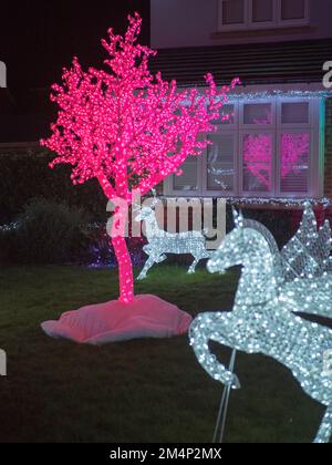 Eastchurch, Kent, UK. 22nd Dec, 2022. Kingsborough Manor estate in Eastchurch, Kent on the Isle of Sheppey goes 'all out' for Christmas with most of the properties in the area being decorated with amazing Christmas lights displays. Credit: James Bell/Alamy Live News Stock Photo